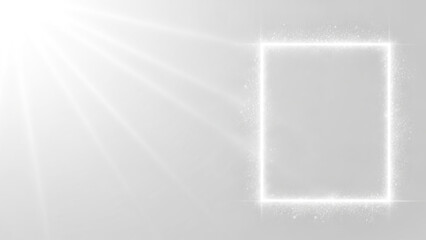 Glowing white rectangle emits radiant beams on a gray background, evoking a sense of modernity and innovation.