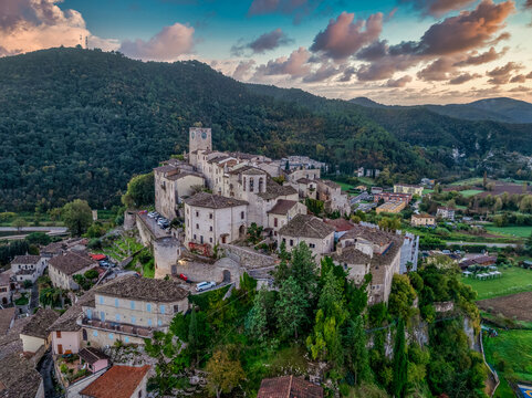 Aerial view of Arrone medieval hilltop village with castle in Valnerina valley Umbria Italy Dramatic sunset sky