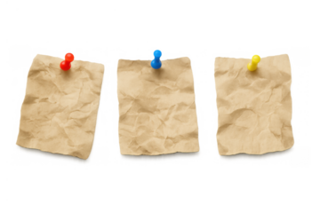 Crumpled vintage paper notes pinned to a background, old craft paper for messages and reminders