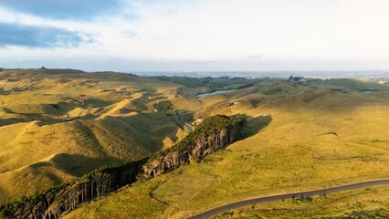 Naklejka premium Vast Green Hills of Karioitahi, New Zealand