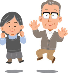 ジャンプするシニアのカップル