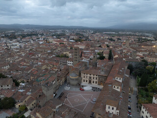 Aerial view of Arezzo medieval town center Piazza Grande, palaces, gothic churches Santa Maria della Pieve