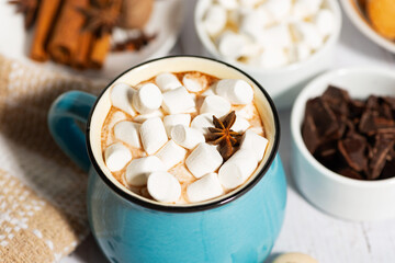 hot chocolate with marshmallows in a mug and cookies, top view