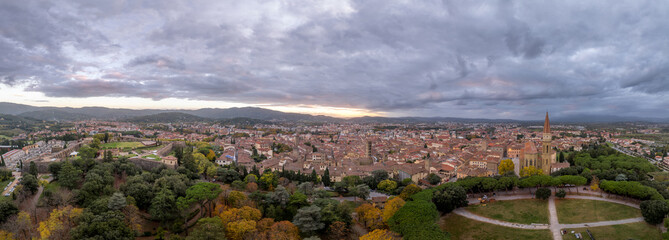 Aerial view of Arezzo medieval town center Piazza Grande, palaces, gothic churches Santa Maria della Pieve