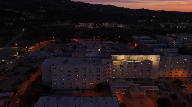 Aerial of Establishing General University Hospital of Patras at dusk, establish