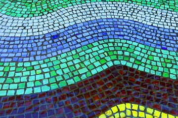Background, texture surface decorated with mosaic tiles, mosaic of bright ceramic tiles