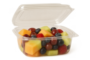 Fresh fruit salad in a clear plastic container with an open lid, a convenient healthy snack or take-out food