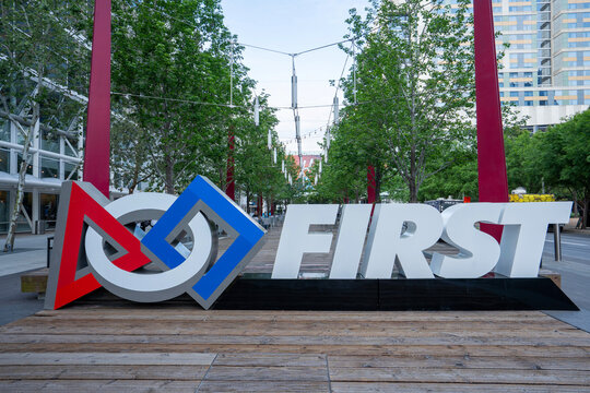 Houston, TX, USA - Apr 16, 2025: FIRST signage is seen outside the George R. Brown Convention Center in Houston, Texas, during the 2025 FIRST Championship robotics competitions.