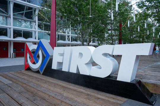 Houston, TX, USA - Apr 16, 2025: FIRST signage is seen outside the George R. Brown Convention Center in Houston, Texas, during the 2025 FIRST Championship robotics competitions.