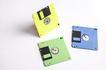 Colored 3.5 inch floppy disks isolated on white background