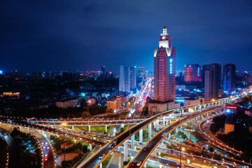 Fototapeta premium Hefei Aerial Night View with Illuminated Skyscrapers and Traffic