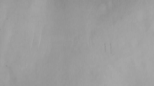 Vintage gray paper texture background with subtle grunge creases, aged surface details, and cinematic film grain overlay.