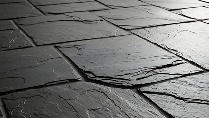 Close-up textured surface of natural slate tiles arranged in an interlocking pattern