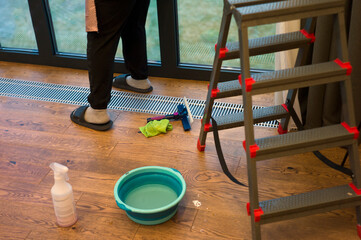  housemaid cleaning window