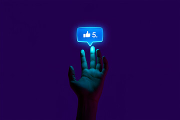 Hand reaching for glowing blue social media like notification with number five touching finger