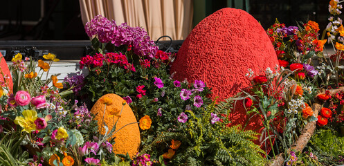 Springtime. Outdoor flower installation with Easter eggs and fresh flowers. Moscow Seasons. Happy Easter 2026.