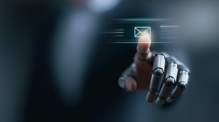 A metallic robot hand with precise movements, activating a digital email icon, signifying seamless technological communication and innovative interface.