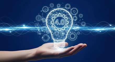 Industry 4.0 Concept: Hand Holding an Illuminated Lightbulb Representing Technological Innovation and Digital Transformation on a Blue Background