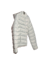 Hanger with short grey puffer jacket isolated on white background © Pixel-Shot