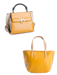 A small handbag with a textured front flap, a short shoulder strap, and a butterfly-shaped metal detail on the front.	
