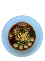 Tender slow-braised beef noodle soup, elegantly served against a clean white background,...
