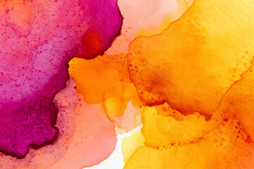 Vibrant abstract watercolor background with artistic horizontal layers of orange yellow and purple wash