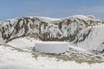 3d render Snow podium background on ice snow mountain or overlooking a cold winter mountain landscape for product stand display, advertising, mockup or etc