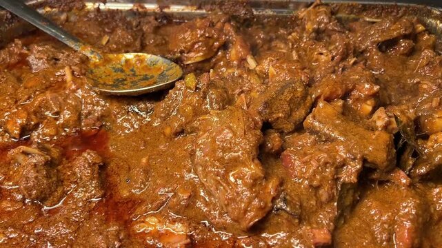 Special mutton curry with extreme spices in an Indian wedding