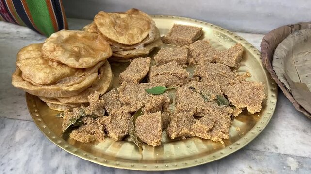 Puri and Halwa served as a prasad in an Indian wedding