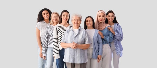 Group of many women on light background. Women's History Month