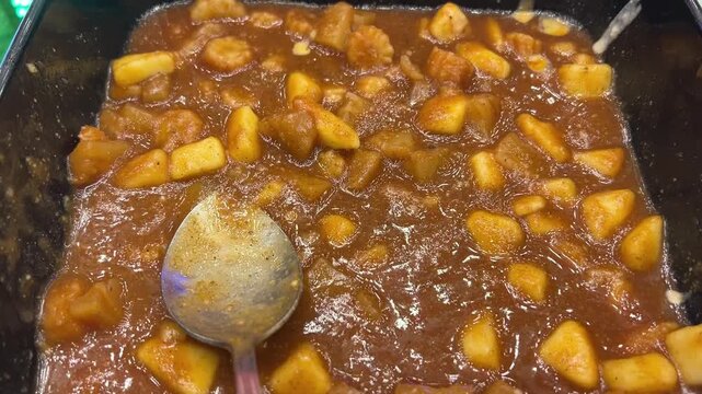 Potato curry made with Bengali spices in an Indian restaurant 