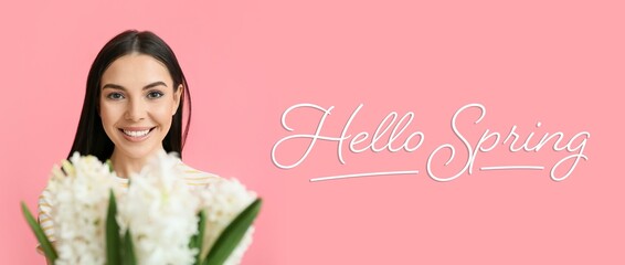 Beautiful young woman with hyacinth flowers and text HELLO, SPRING on pink background © Pixel-Shot