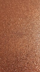 Rose gold glitter texture background with dense sparkle and luxury metallic shine
