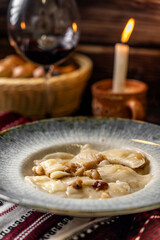 Traditional Dumplings With Fried Bacon Topping