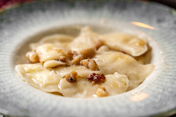 Traditional Dumplings With Crispy Bacon And Butter