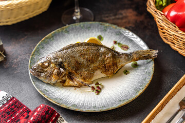 Whole grilled sea bream rustic plate