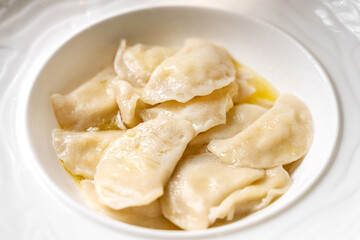 Traditional vareniki dumplings with butter