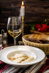 Traditional vareniki dumplings with butter dinner
