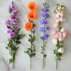 Floral stems in violet, orange, blue, & pink, flat lay