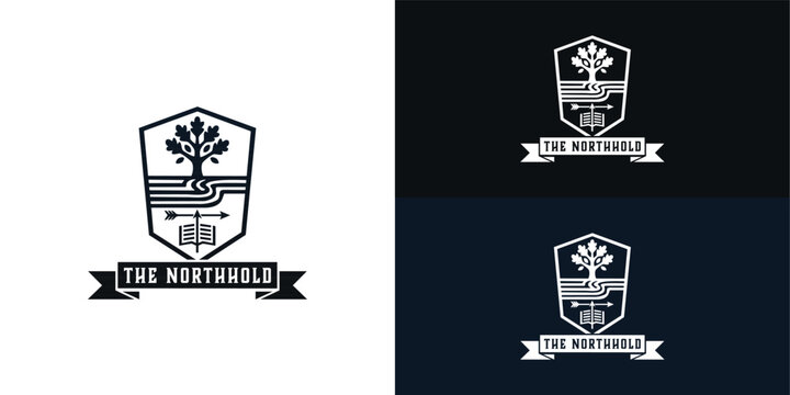 The modern black shield crest features a sturdy tree, winding paths, and an arrow positioned above an open book. This design successfully blends a bold, simplistic aesthetic with heritage.