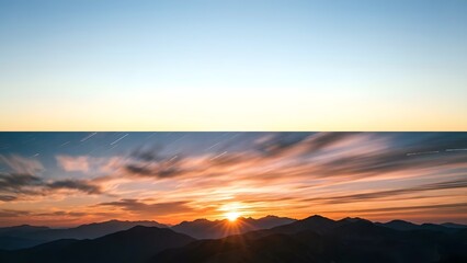 Obraz premium Sunrise over mountains with colorful clouds.