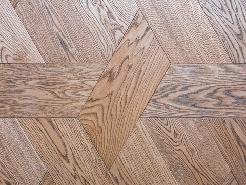 Oak wood parquet flooring pattern with geometric shapes