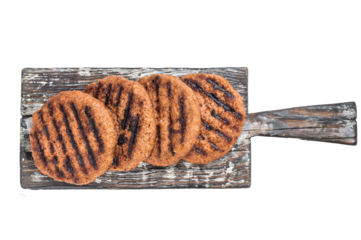Plant based meat alternative burger patties grilled  vegan food isolated on light background