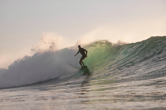 Surfer Cruising Dawn Surf Relaxed Smooth