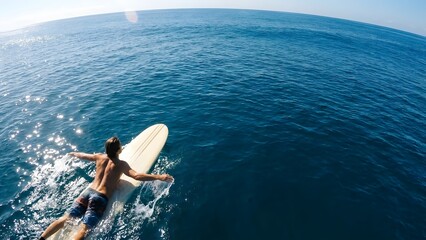 Surfer Riding Wave in Ocean Water.