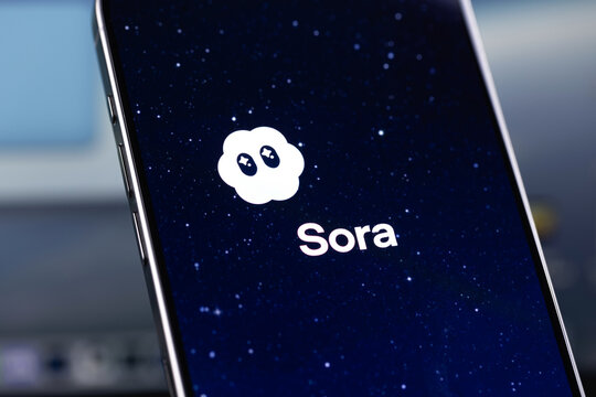 Sora logo mobile app on a screen smartphone iPhone. Sora is an AI model designed to generate full HD video from a short text description, developed by OpenAI. Batumi, Georgia - November 12, 2025