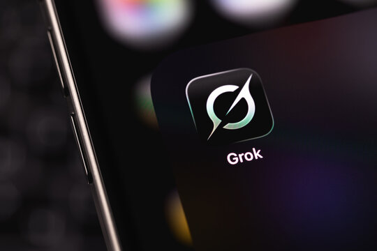 Grok mobile icon app on a screen smartphone. Grok is a generative AI-powered chatbot developed by xAI. Batumi, Georgia - November 12, 2025