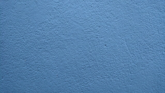 Blue plaster wall texture background surface pattern