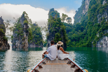 Enchanting moments on Cheow Lan Lake in Khao Sok Thailand amidst stunning limestone cliffs