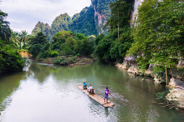 Explore the serene beauty of Khao Soks lush landscapes and tranquil waters in Thailand